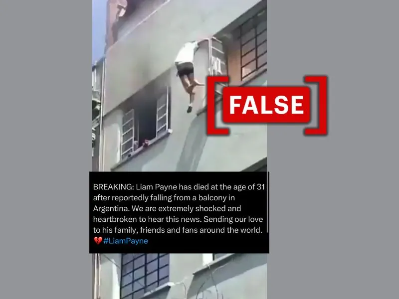 This image is a screenshot of a video claiming to show former One Direction member, Liam Payne jumping from a building. This image is overlaid with a false sticker on it.